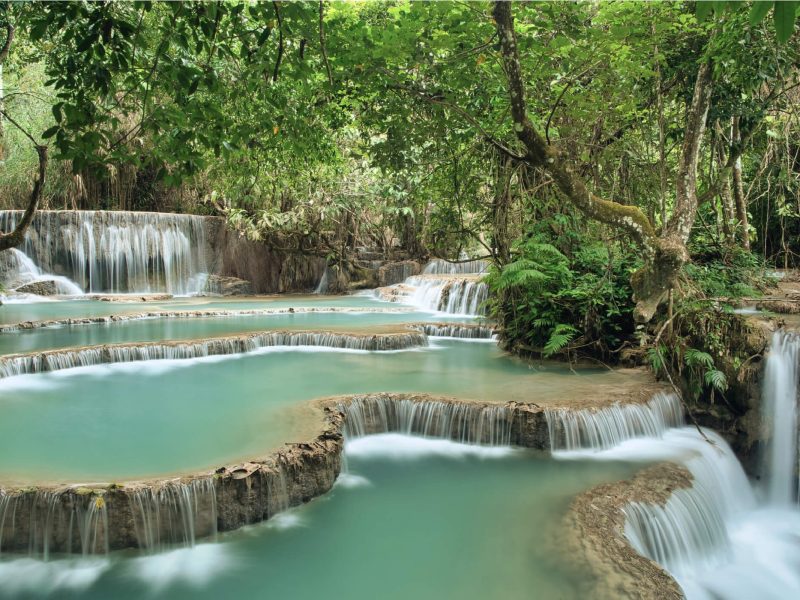 visit kuang si waterfalls in Highlights of Northern Laos Tour - Find My River Cruise